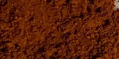 A close up of some brown dirt